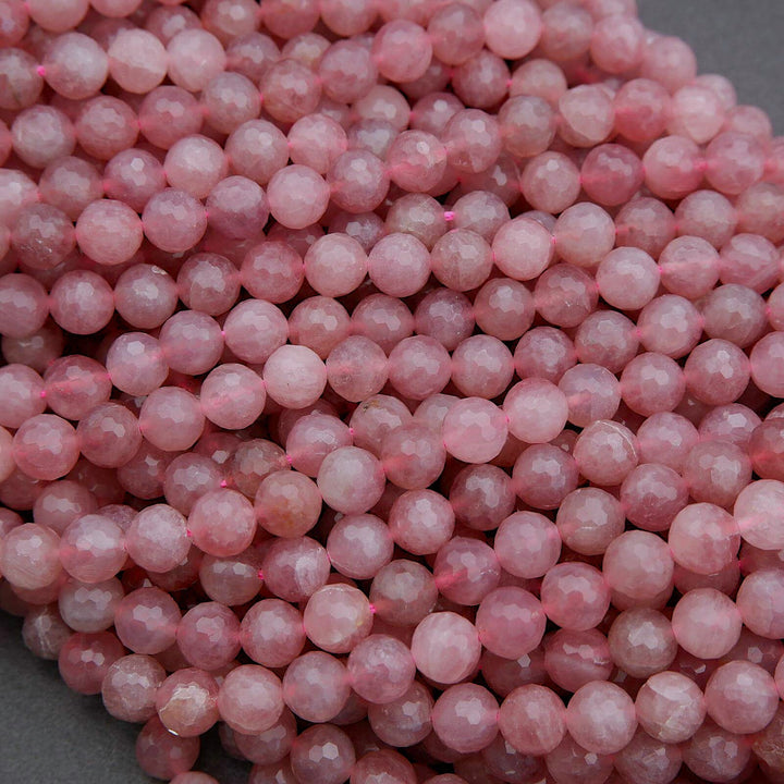Close-up of pink beads on a gray background