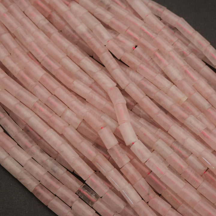 Close-up of pink woven material on a dark background