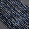 Close-up of blue beads on a dark background