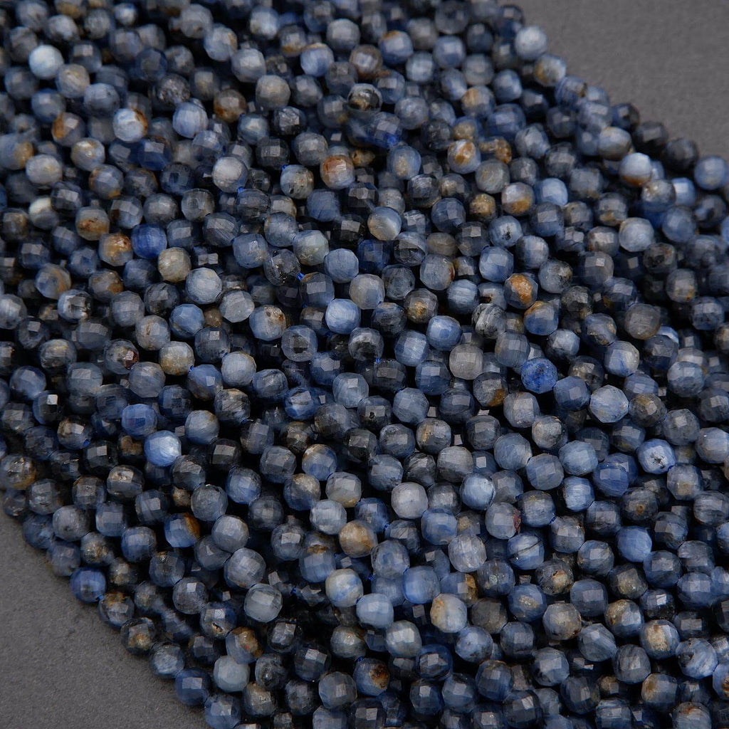 Close-up of blue beads on a dark background