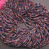 Multicolored beaded scarf on a dark surface