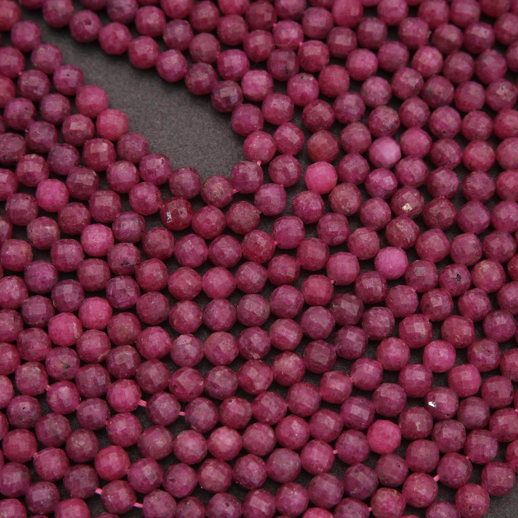 Close-up of purple beads on a dark background