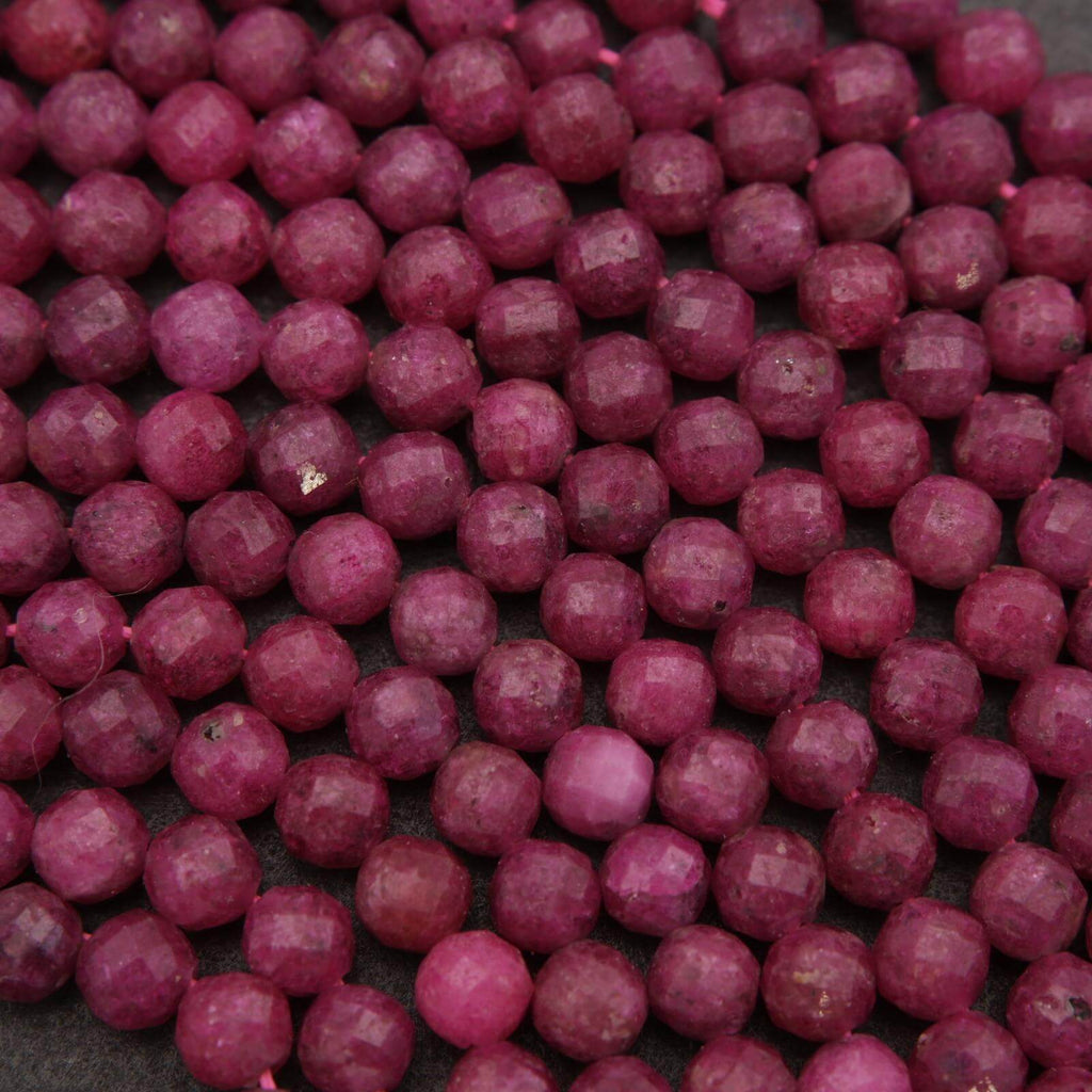 Close-up of purple beads on a dark background