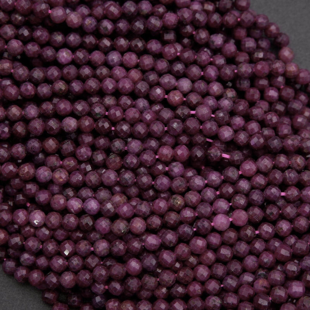 Close-up of purple beads on a dark background