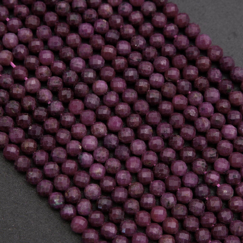 Close-up of purple beads on a dark background
