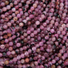 Close-up of pink and black beads