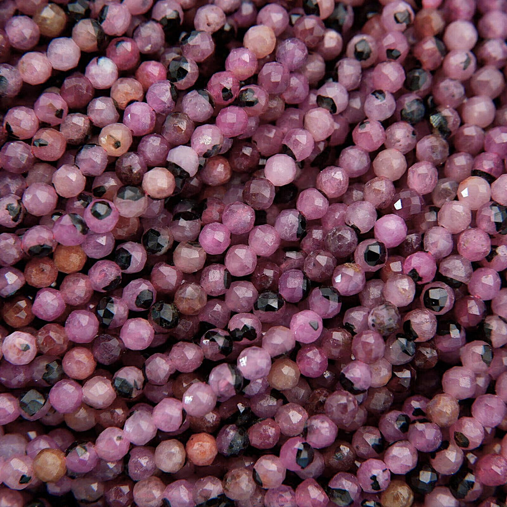 Close-up of pink and black beads