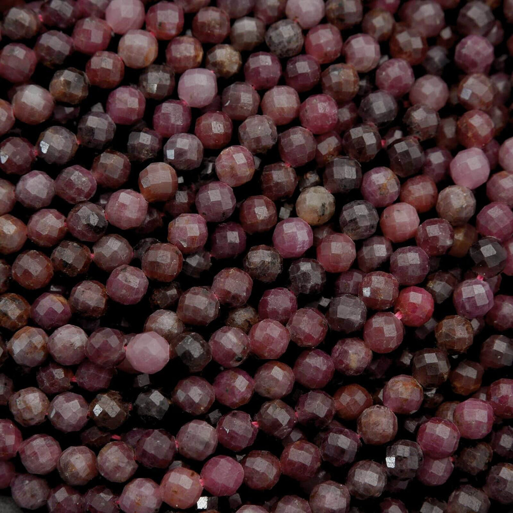 Close-up of faceted purple gemstones.
