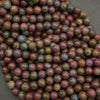 Multicolor ruby kyanite polished round beads