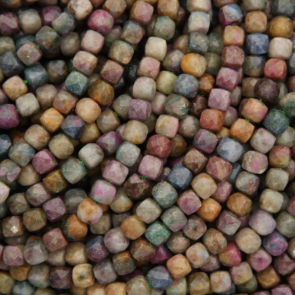 Close-up of multicolored small cube-shaped beads.