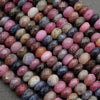 Natural ruby and sapphire gemstone beads in mixed shades of pink, blue, and earthy tones
