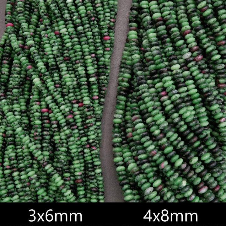 Ruby zoisite rondelle bead strands shown side by side in 3x6mm and 4x8mm sizes with green, black, and pink natural color variation.