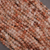 Clear faceted beads with brown needles.