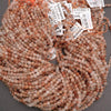 Clear faceted beads with brown needles.