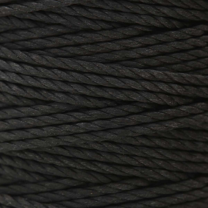Extreme close-up of black S-Lon Heavy Twisted Cord, highlighting the tightly twisted fibers and slightly textured surface.