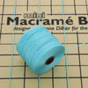 Close-up of aqua 3-ply bonded nylon S-Lon Bead Cord on spool