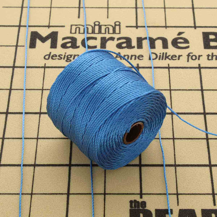 The Beadsmith S-Lon Bead Cord in blue, Tex 210, 77 yard spool