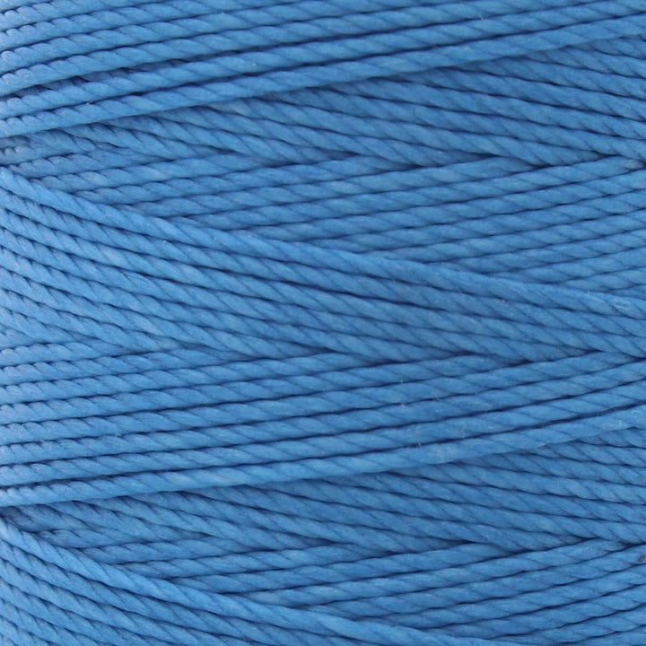 Close-up of Carolina blue 3-ply bonded nylon S-Lon Bead Cord on spool