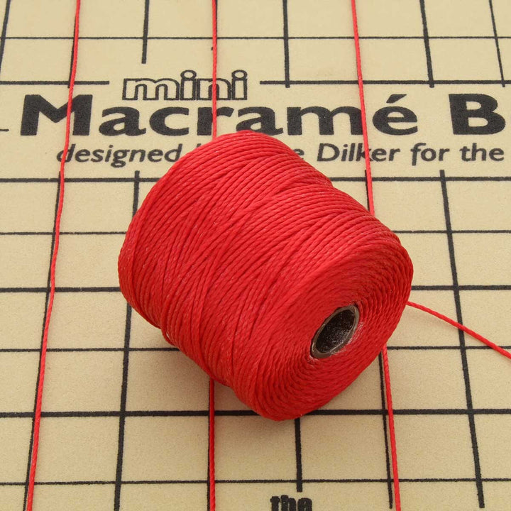 The Beadsmith S-Lon Bead Cord in Shanghai red, Tex 210, 77 yard spool