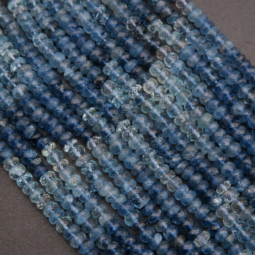 Close-up of blue beads on a dark background