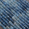 Close-up of blue beads with a blurred background