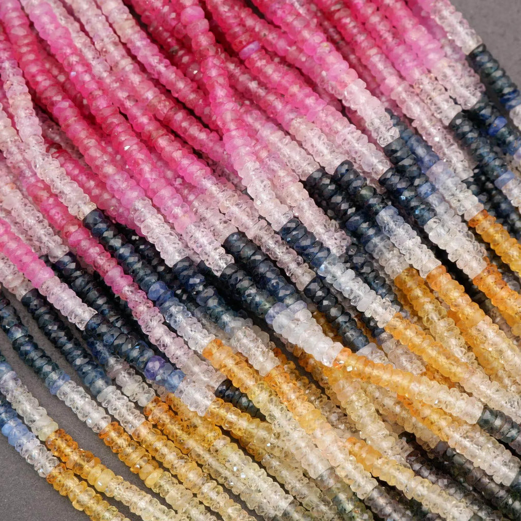 Close-up of multicolored beads on a gray background