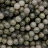 Close-up of green and gray marbled beads