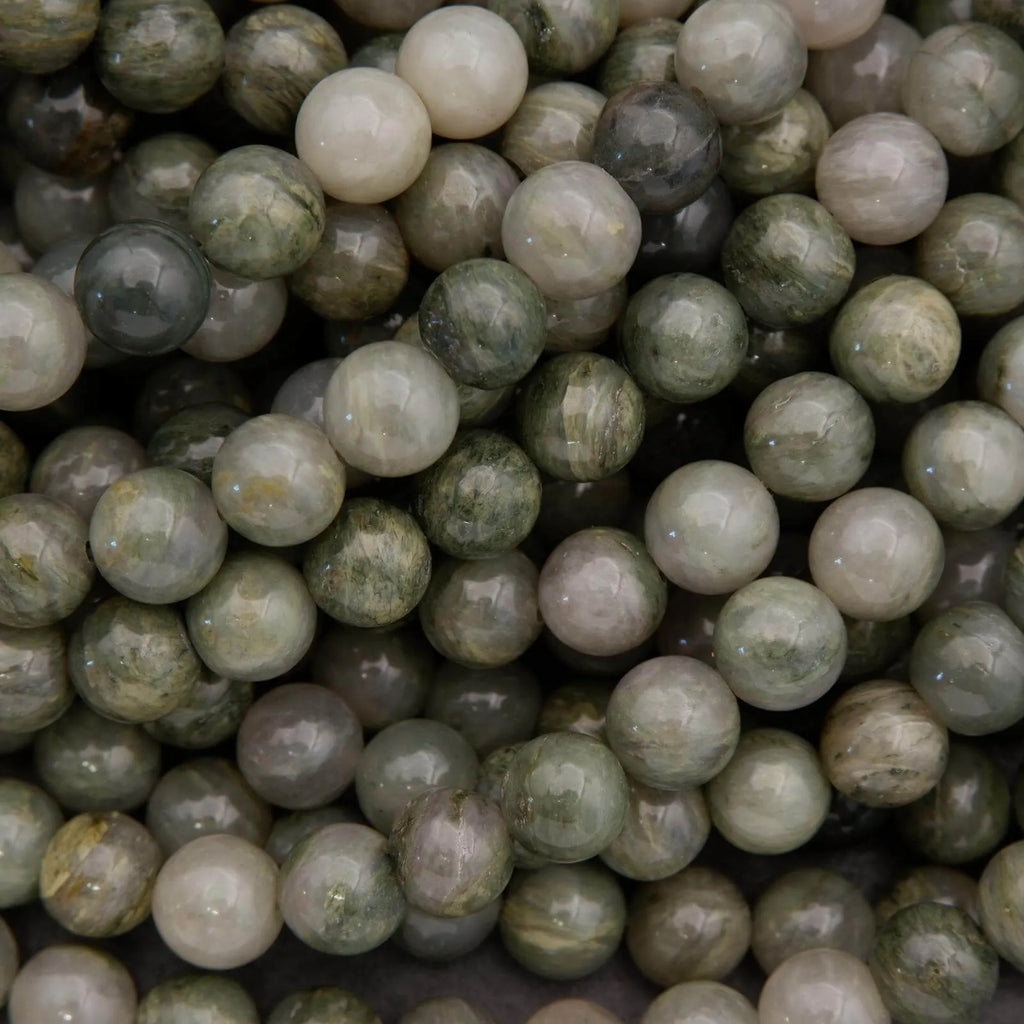 Close-up of green and gray marbled beads
