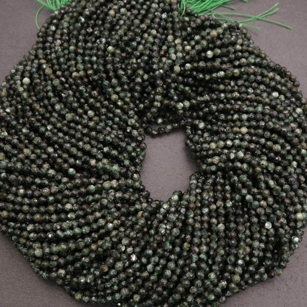 Green beaded scrunchie on a gray background