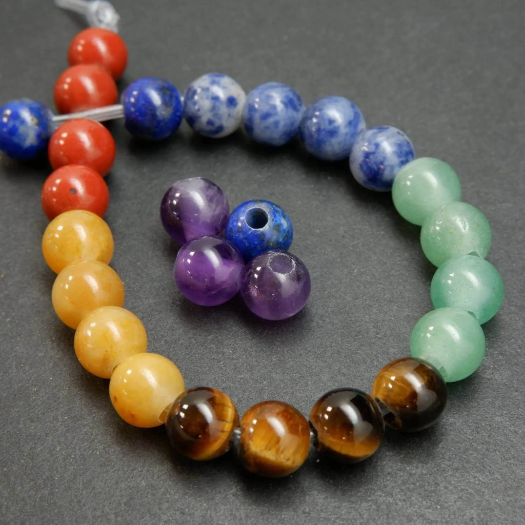 Multicolored beaded bracelets on a gray surface