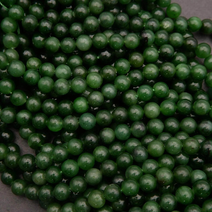 Close-up of green beads on a dark background