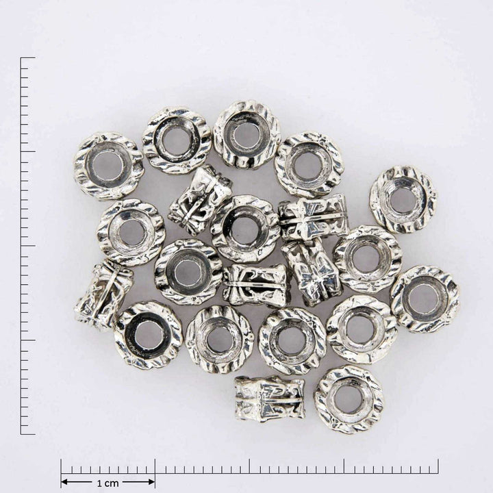 Silver bead cap jewelry findings.