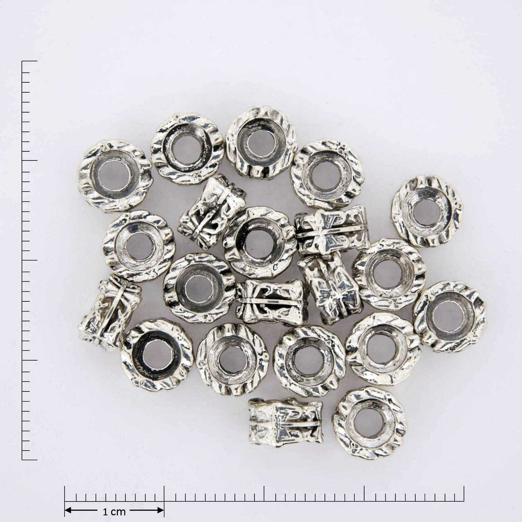 Silver bead cap jewelry findings.
