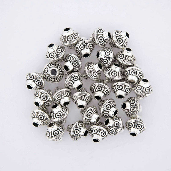 Silver Bicone Beads.