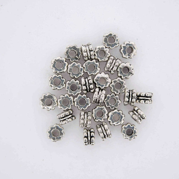 Silver Flower Spacer Beads.
