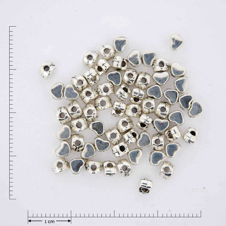 Silver heart jewelry findings.