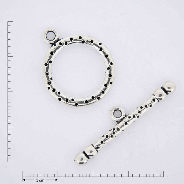 Dotted toggle clasp.