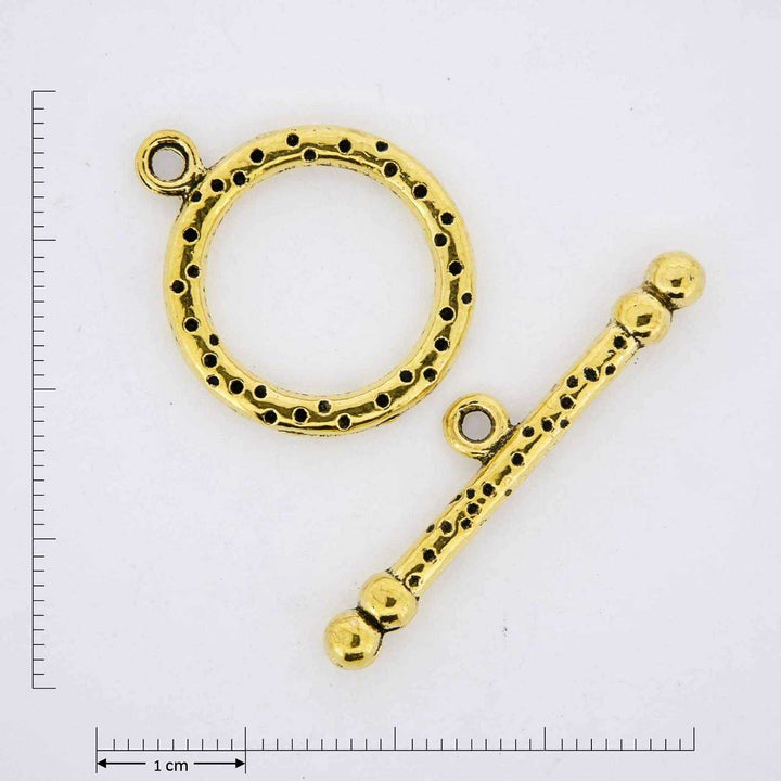 Gold jewelry finding toggles.