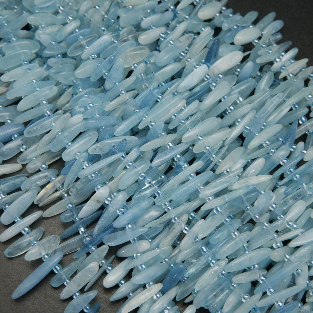 Aquamarine stick shape beads.