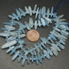 Aquamarine stick shape beads.