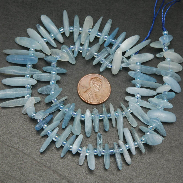 Aquamarine stick shape beads.