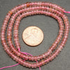 Pink translucent strawberry quartz beads.