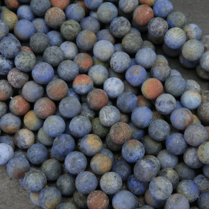 Matte finish blue sunset dumortierite beads.