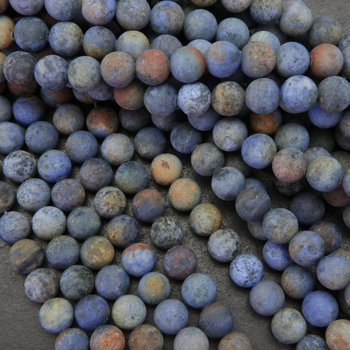 Matte finish blue sunset dumortierite beads.