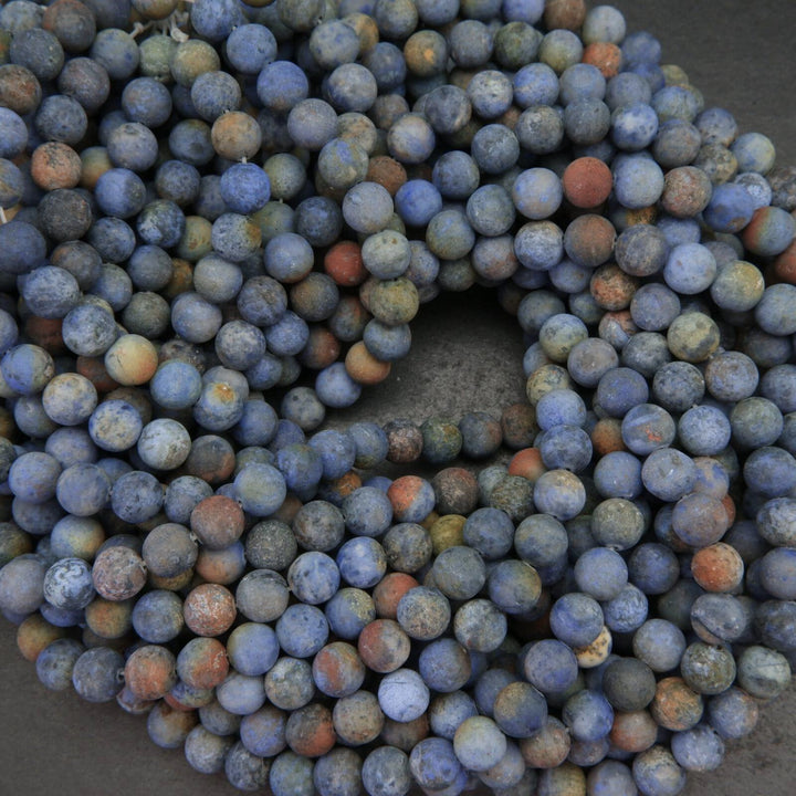 Matte finish blue sunset dumortierite beads.
