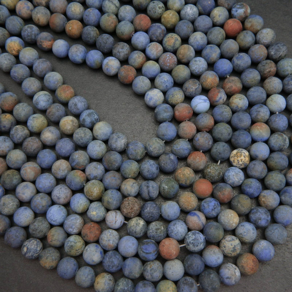 Matte finish blue sunset dumortierite beads.