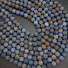 Blue matte sunset dumortierite beads.