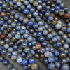 Blue with brownish accents sunset dumortierite beads.