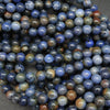 Blue with brownish accents sunset dumortierite beads.