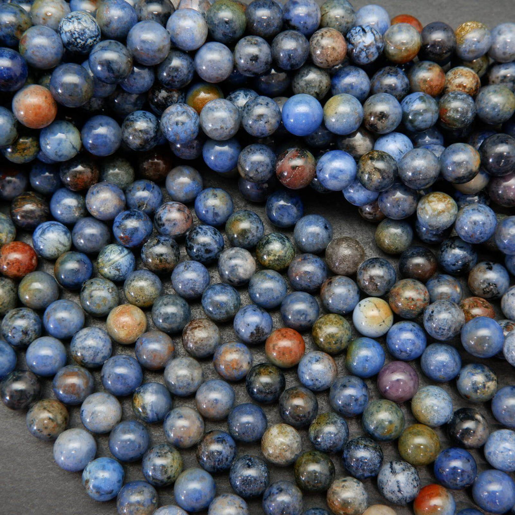 Mixed blue and red sunset dumortierite beads.